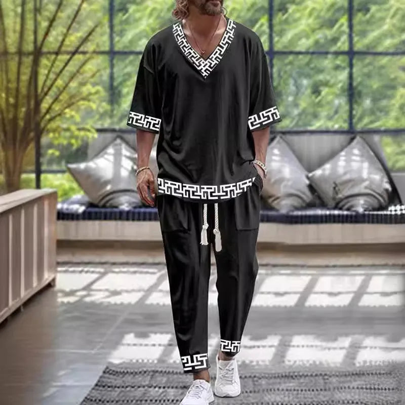 Cropped sleeves V-neck trousers suit in lightweight polyester fabric with matching trousers