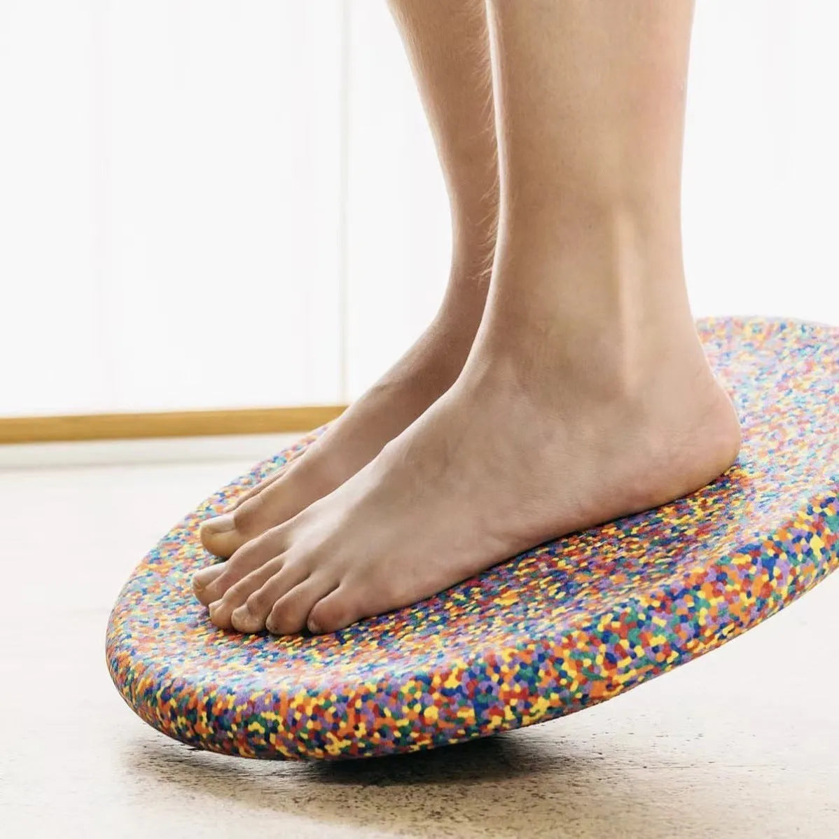 Plastic wood surf balance board for children aged 4-6 with mixed colour wood grain and black design.