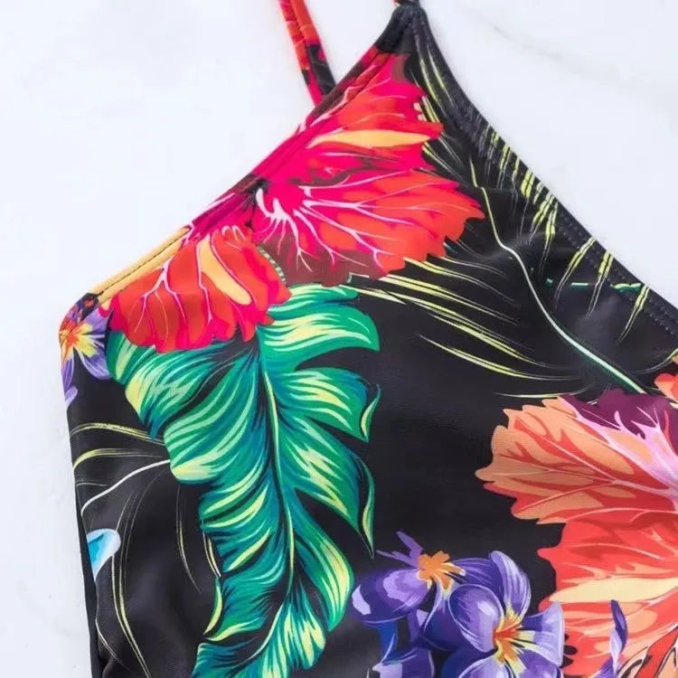 Black women's high waist printed bikini briefs on a plain background.