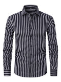 Man wearing a slim fit blue and white striped long sleeve business shirt.