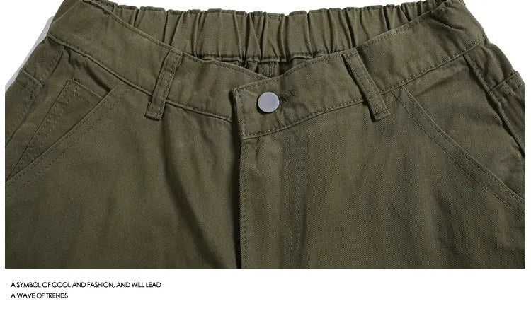 Casual wide-leg cropped workwear pants in apricot colour on a mid-waist fit model.