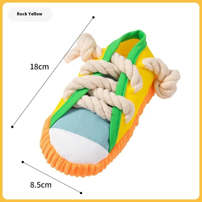 Plastic dog chew toy in three colours with bendable design and sound mechanism