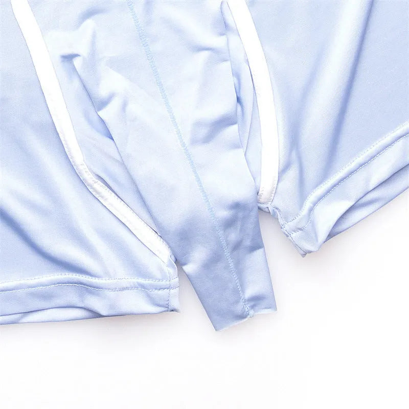 Men's solid colour ice silk boxer shorts laid flat, showing mid-waist design.