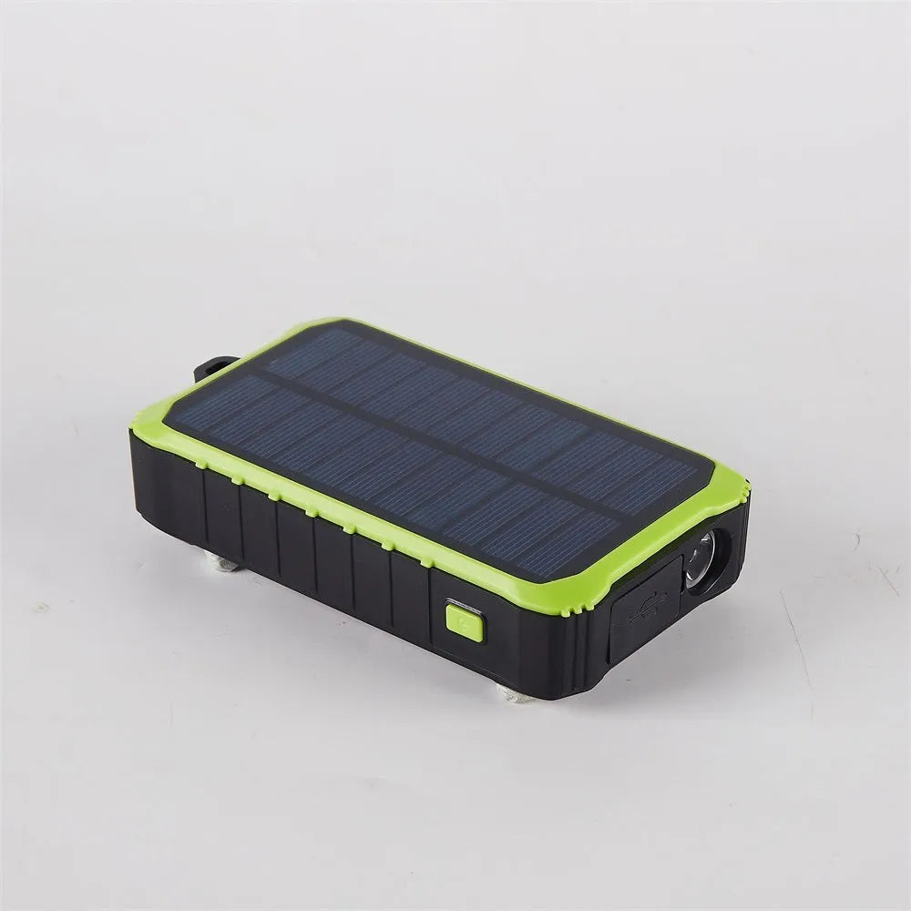 Green or orange hand solar mobile power bank showing dual USB ports and solar panel