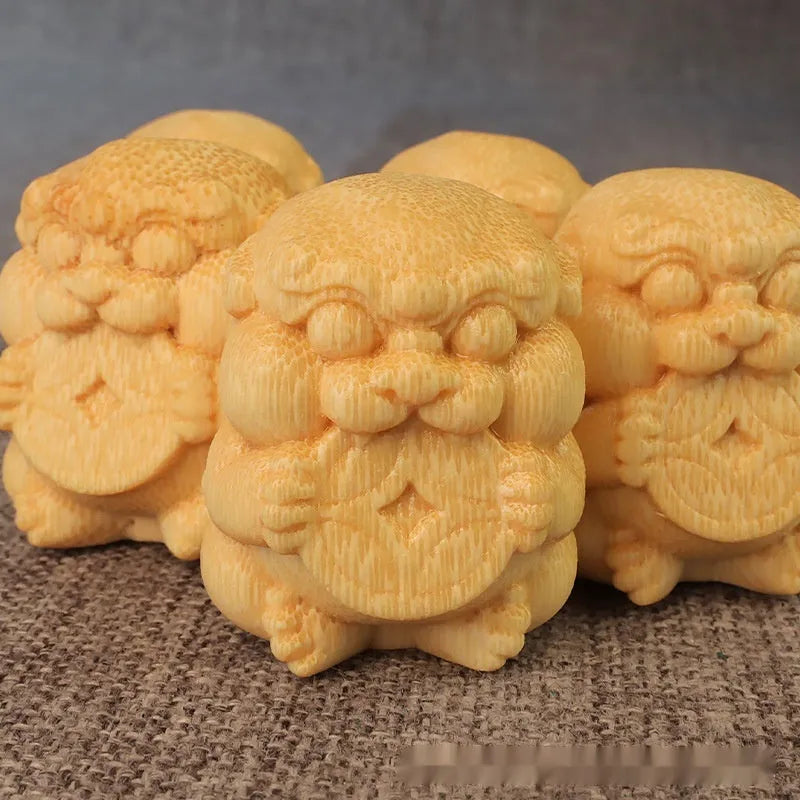 Solid bamboo carving ornament with Take Money motif, 4.5cm tall.
