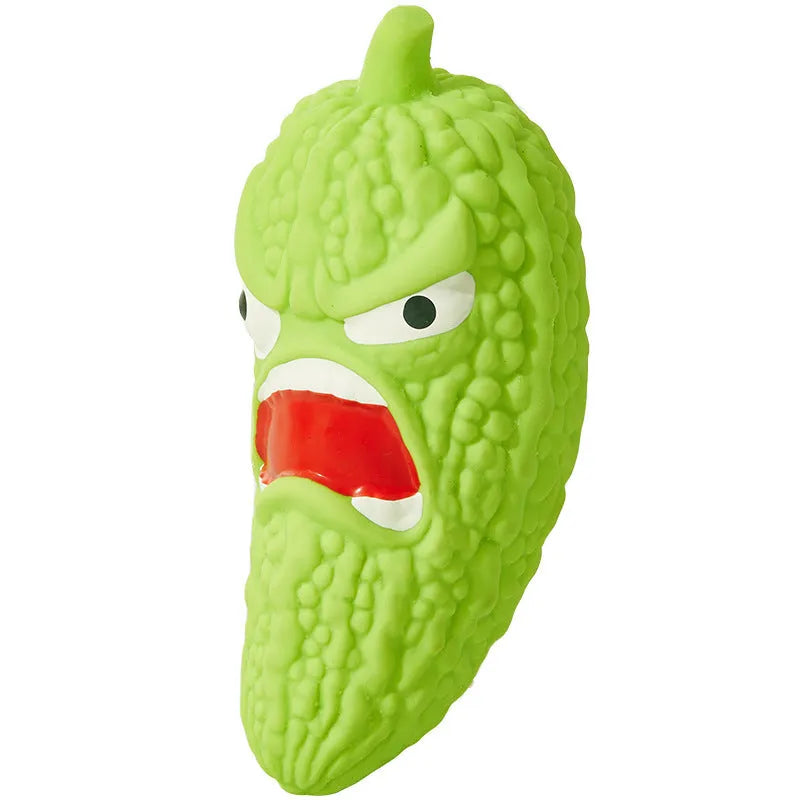 Bitter melon or chilli shaped dog chew toy with textured surface for teeth cleaning and integrated sound element