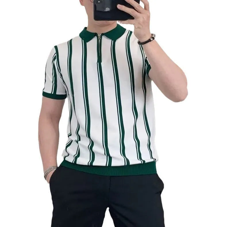 Man wearing a black vintage stripe t-shirt with a cartoon print and a zip detail on the half sleeve.