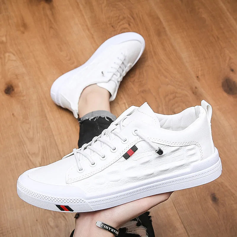White men's lace-up casual sneakers with round toe and flat rubber sole.