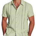 Man wearing a slim fit, short sleeve Hawaiian shirt with a digital print pattern.