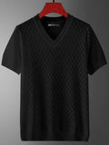 Man modelling a white ice silk V-neck t-shirt with a cut-out detail on the chest.