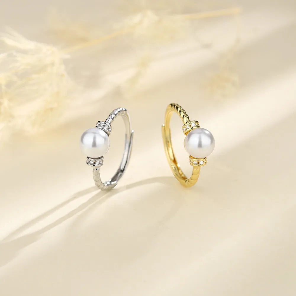 Adjustable copper pearl ring with geometric design in gold or silver finish
