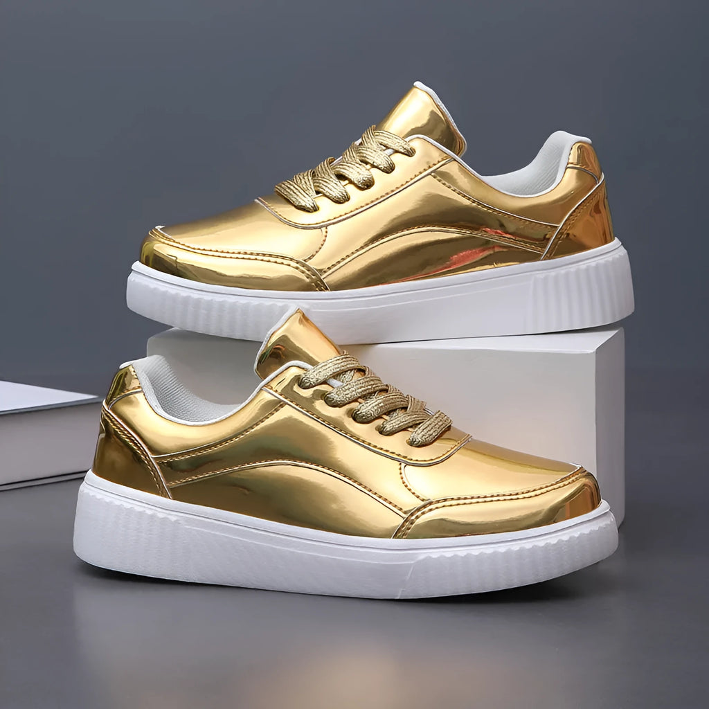 Sparkling gold sequinned platform sneakers with a round toe and thick MD sole.