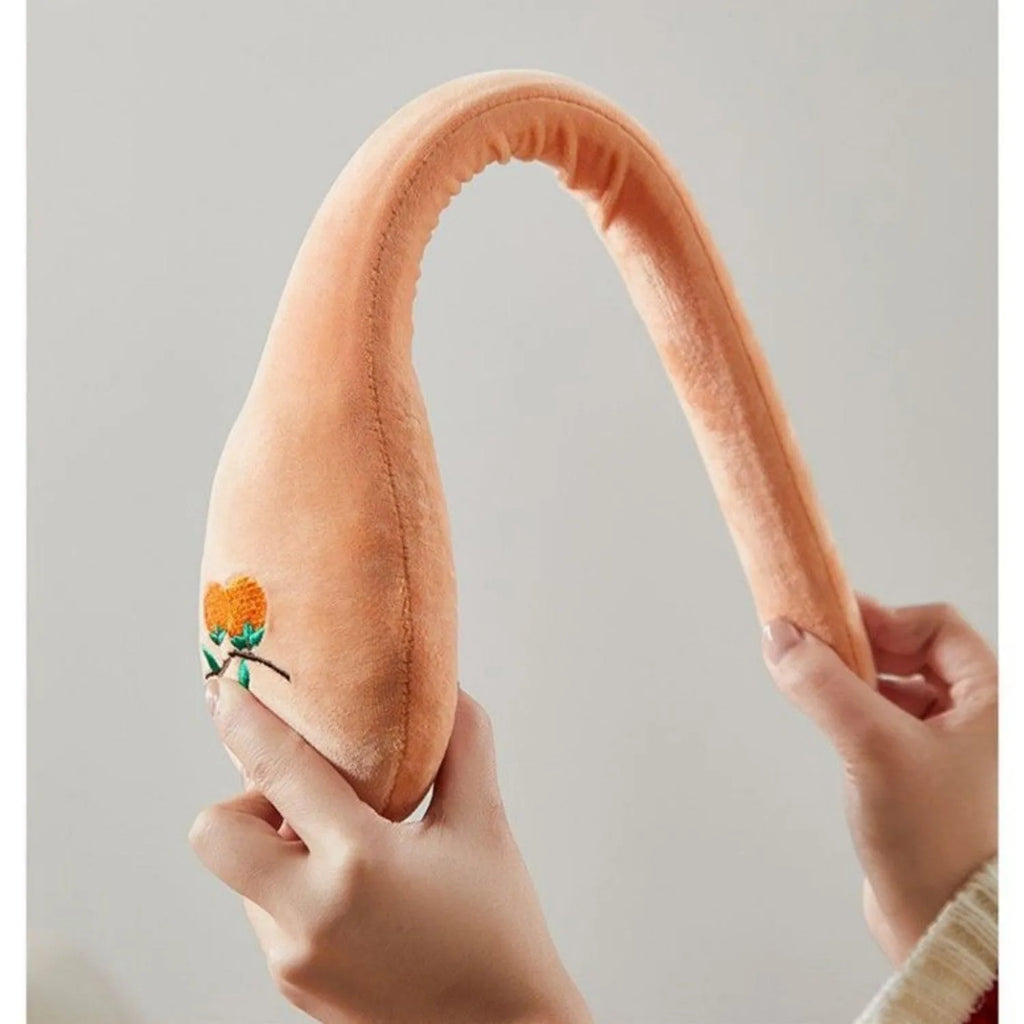 48 cm long persimmon-colour back pounding stick with meridian flap and zipper style for percussion massage.