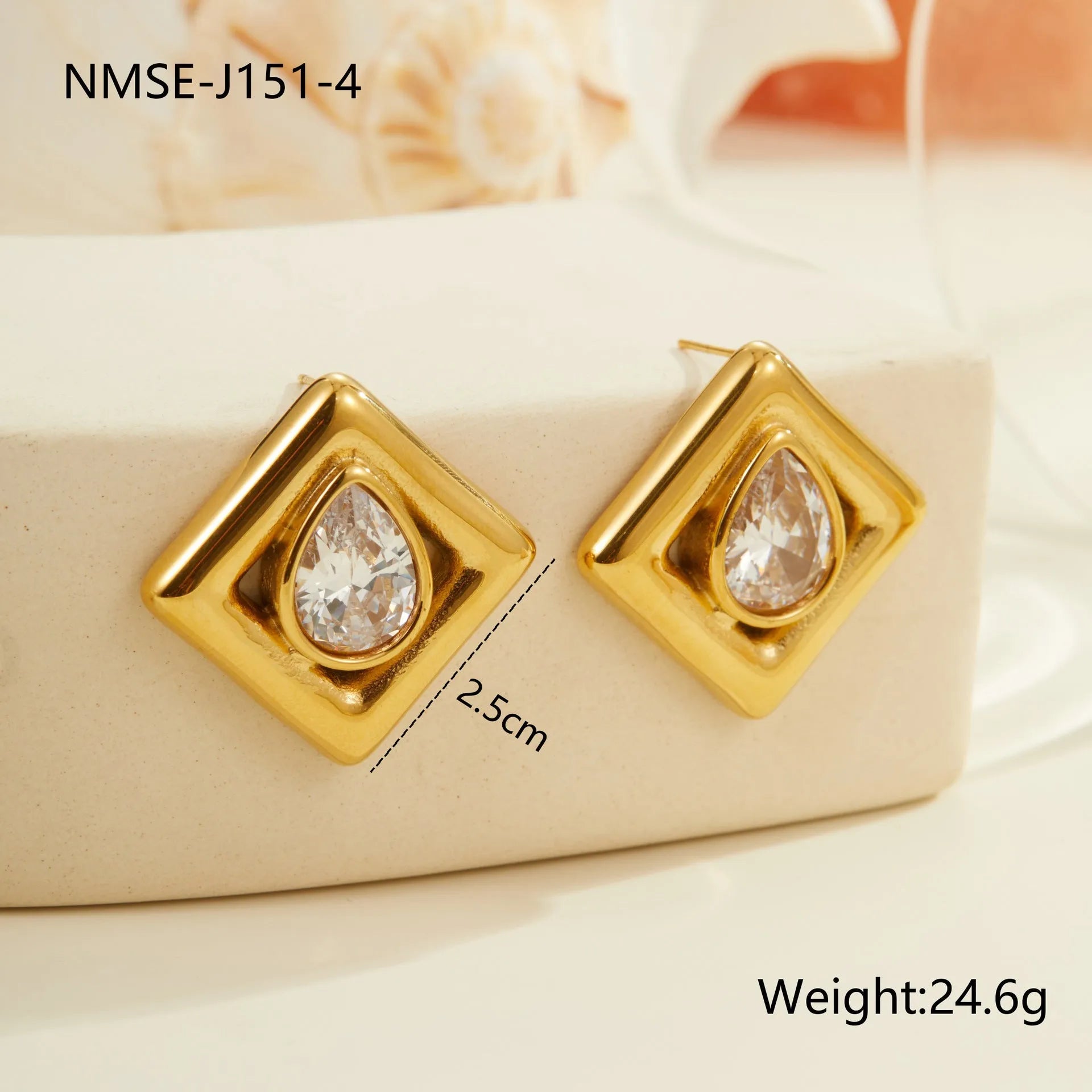Geometric water drop shaped stud earrings with inlaid zircon stone and gold colour finish