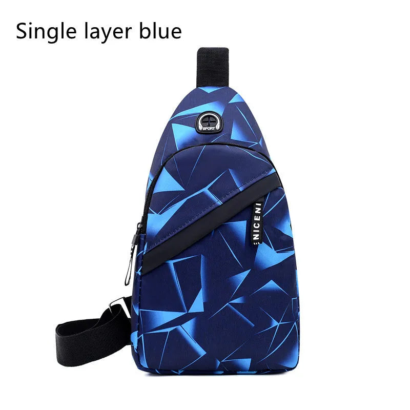 Men's blue print sling chest bag with earphone hole, shown worn crossbody.