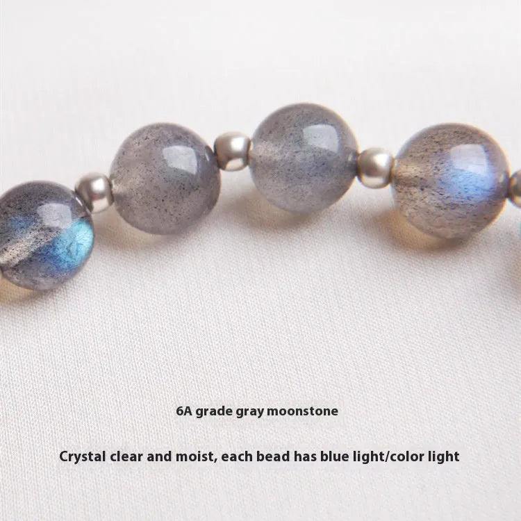 Women's 925 silver bracelet with a 7.5mm grey moonlight lime crystal zodiac charm.