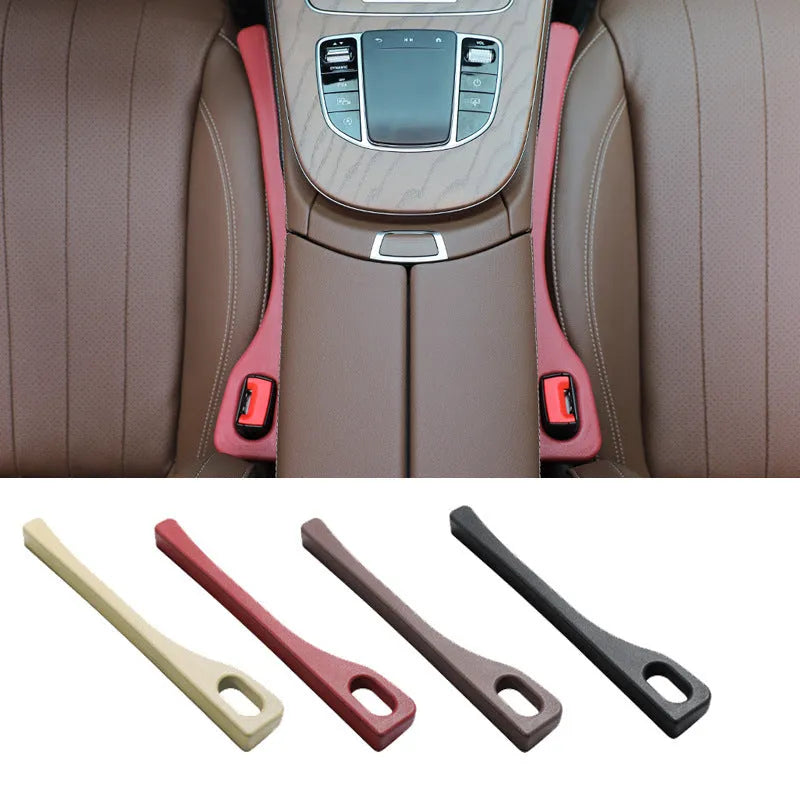 A pair of polyurethane car seat gap strips in beige colour on a car seat.