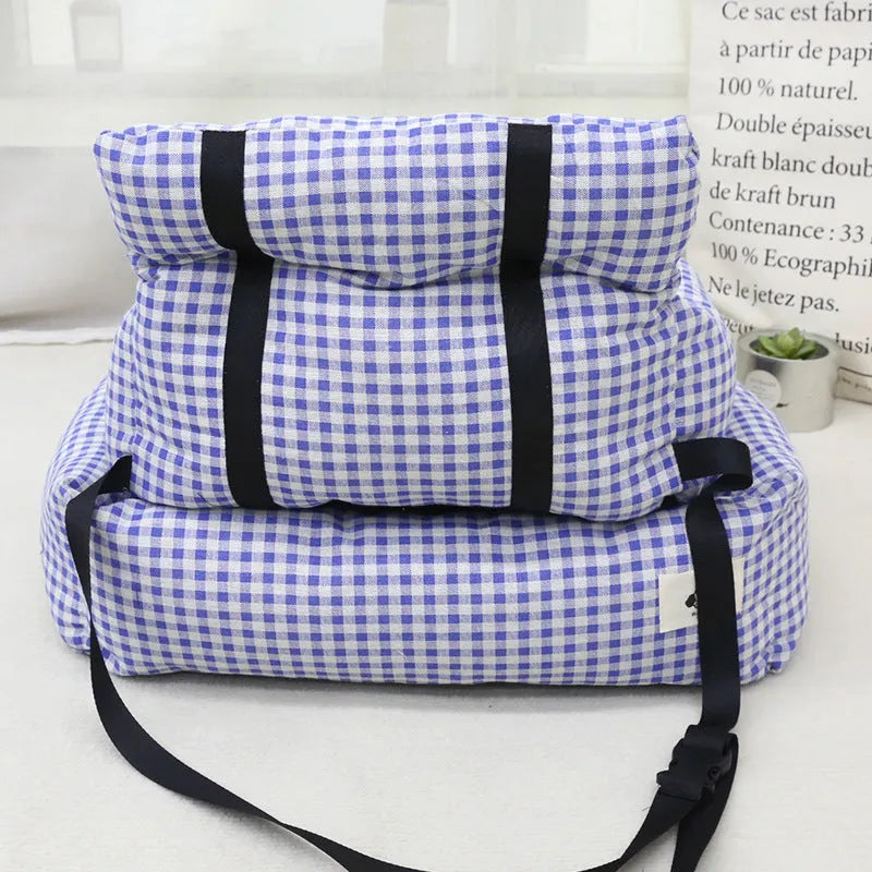 Car-mounted pet travel nest in stain-resistant cloth fabric showing grey and blue plaid colour options