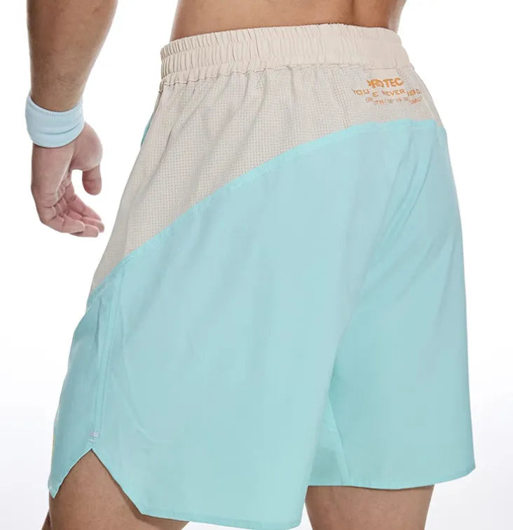 Men's hipp lifting workout shorts in loose fit design with elastic waist