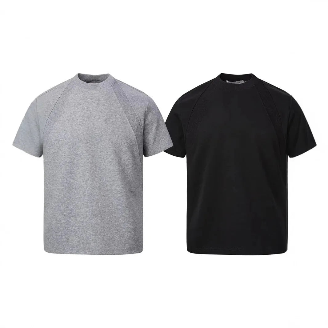 Loose fit short sleeve top with air layer stitching detail in black, grey, or white.