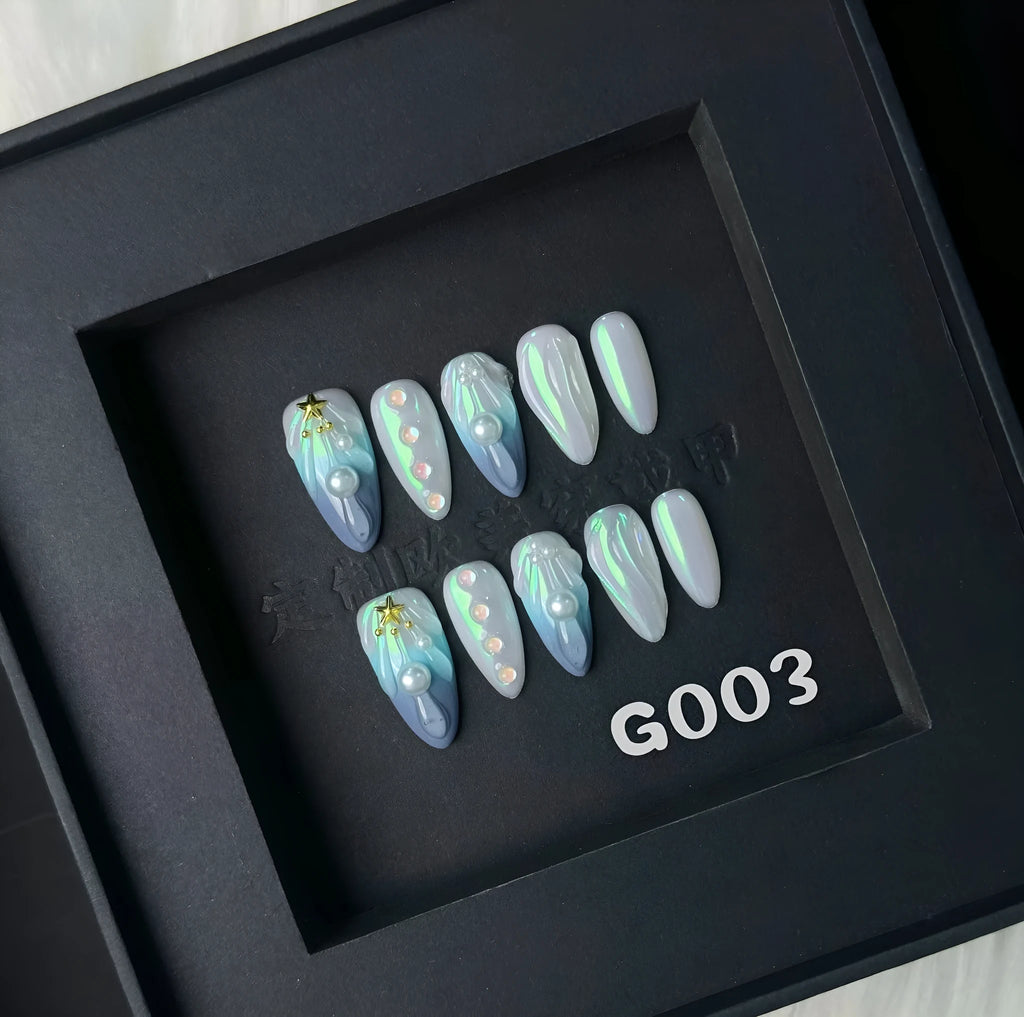 Blue summer design plastic false nail stickers in XS, S, M, L sizes.