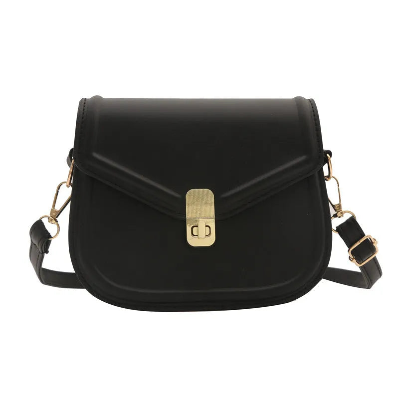 Soft, textured PU clamshell messenger bag in a horizontal rectangle shape.