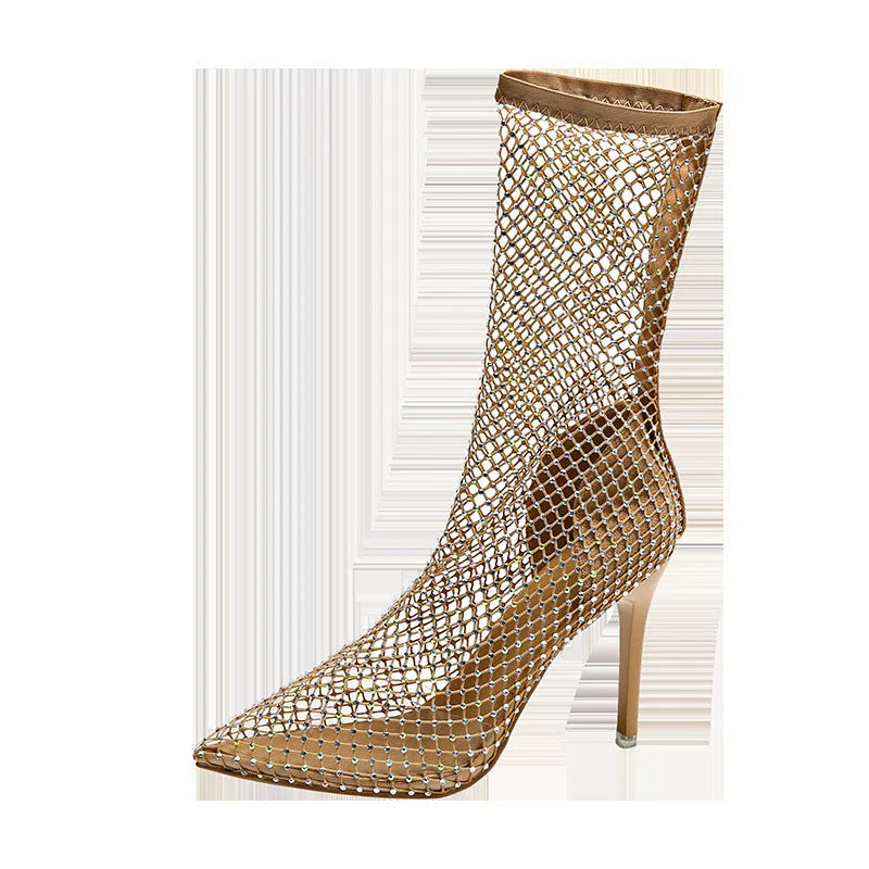 Gold women's high heel sandals with a mesh upper, pointed toe, and stiletto heel on a rubber sole.