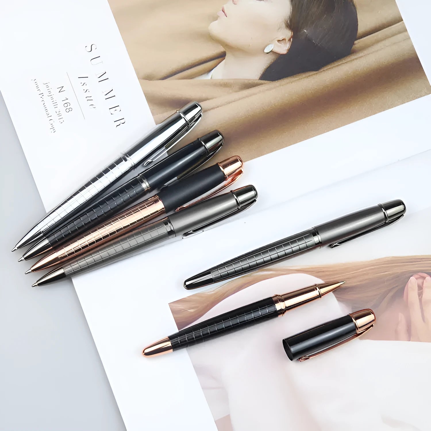 Grey metal roller pen with 13.5cm barrel and water-based ink refill