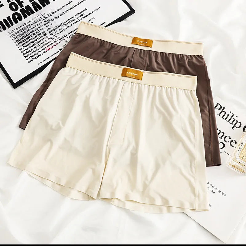 Men's solid colour loose ice silk underwear in a multi-pack.