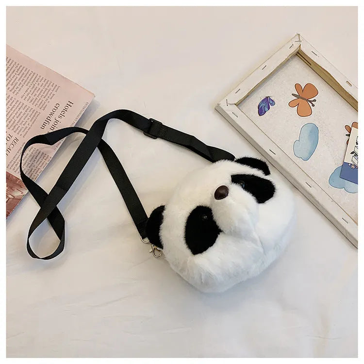 Soft plush cylindrical crossbody bag with panda head print, showing sandwich pocket