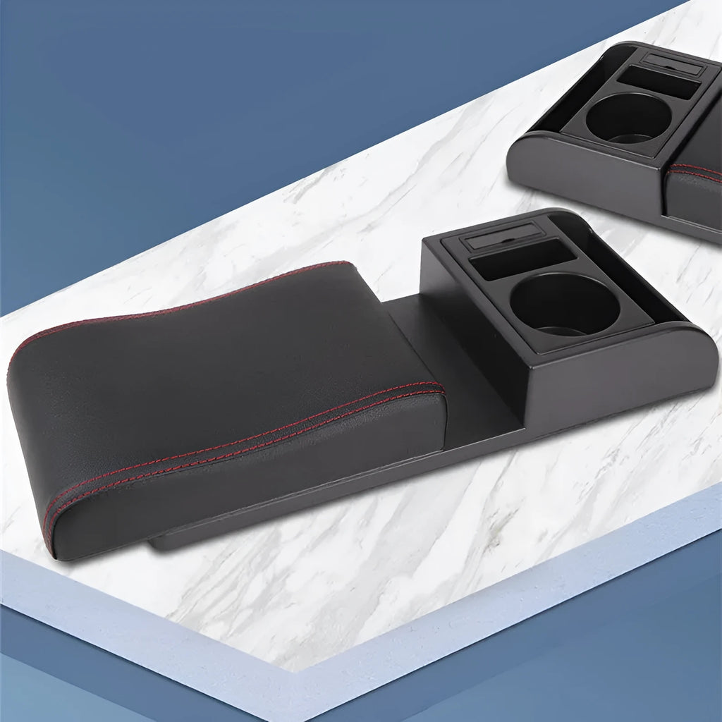 Universal automobile armrest box cover in black with red accent lines on car centre console