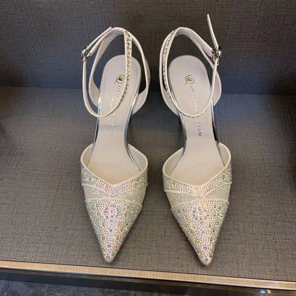 Women's hollow high heels with red sole and stiletto heel in black or silver colours