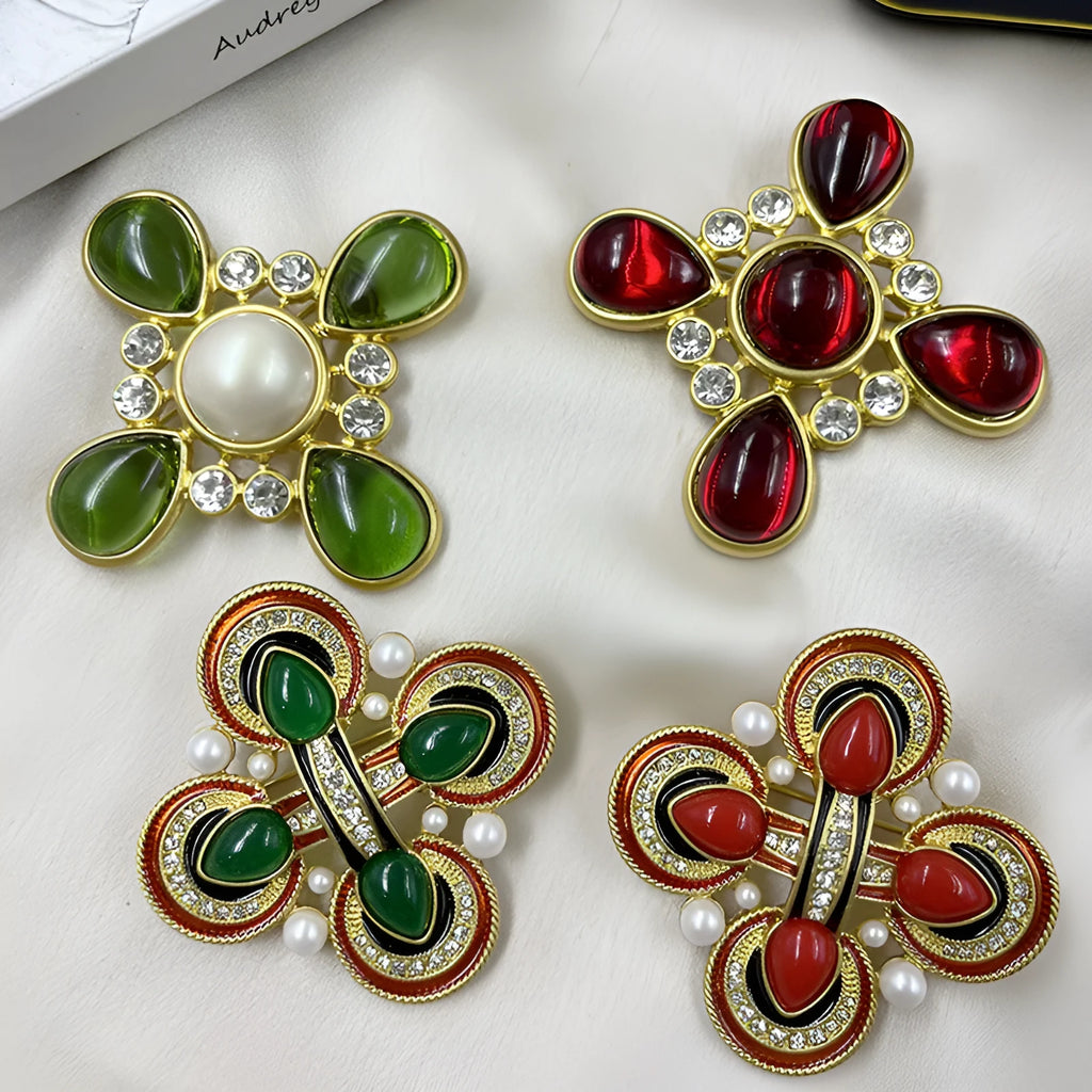 Close-up of a medieval-style baroque cross brooch with crystals, made from zinc alloy in a vintage colour finish.