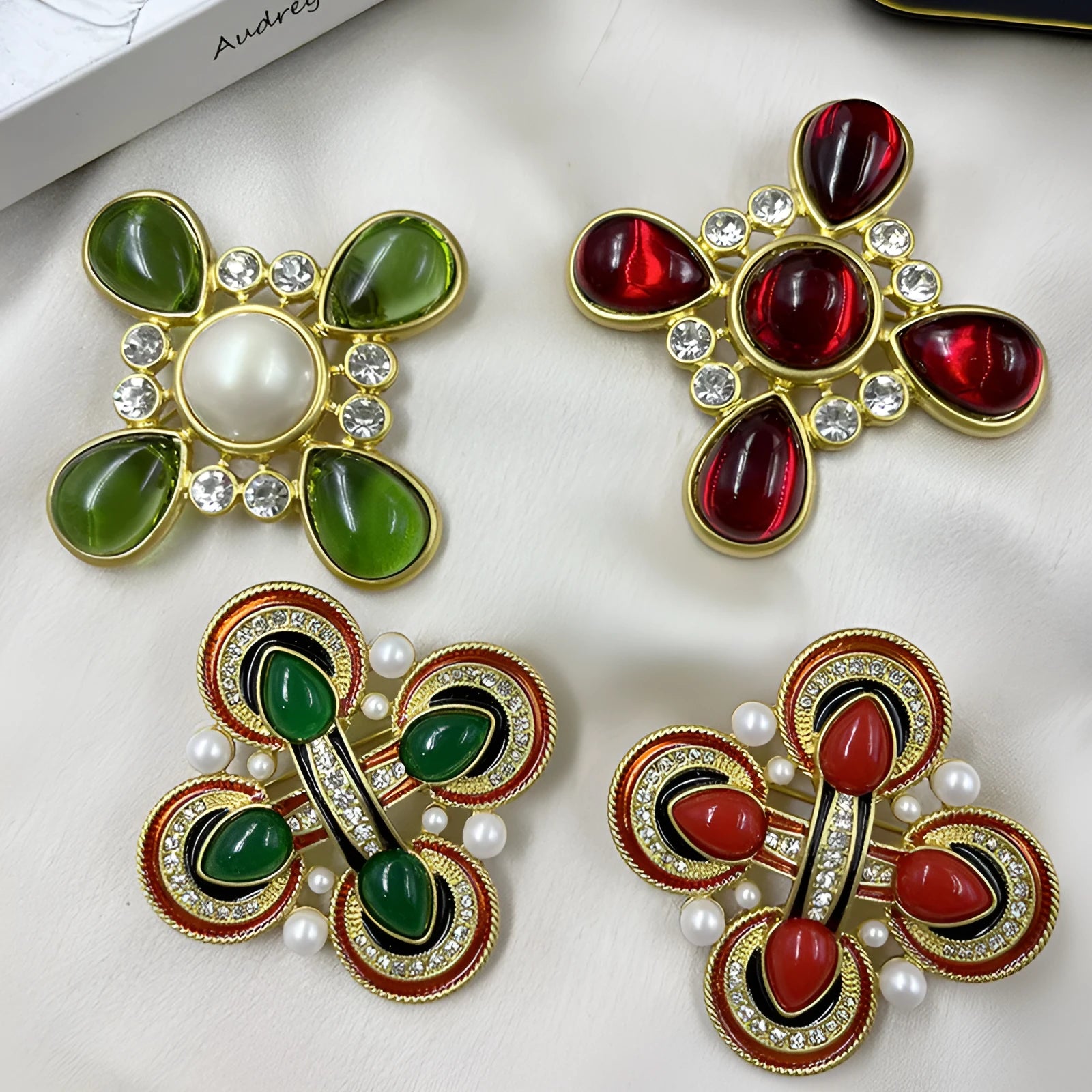 Close-up of a medieval-style baroque cross brooch with crystals, made from zinc alloy in a vintage colour finish.