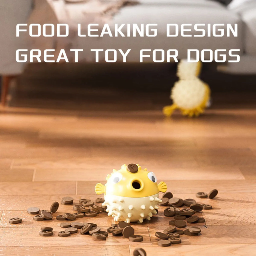 Yellow vinyl fish-shaped dog chew toy with textured surface for aggressive chewers
