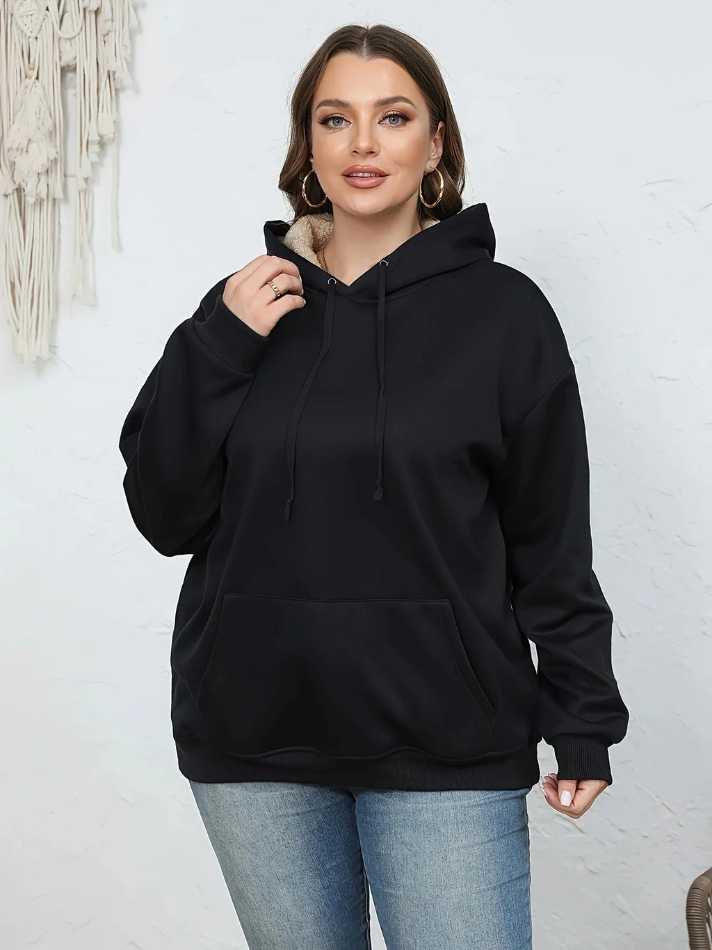 Women's thick polyester hooded sweater in wine red with a 3D pattern, hood, and front pockets.