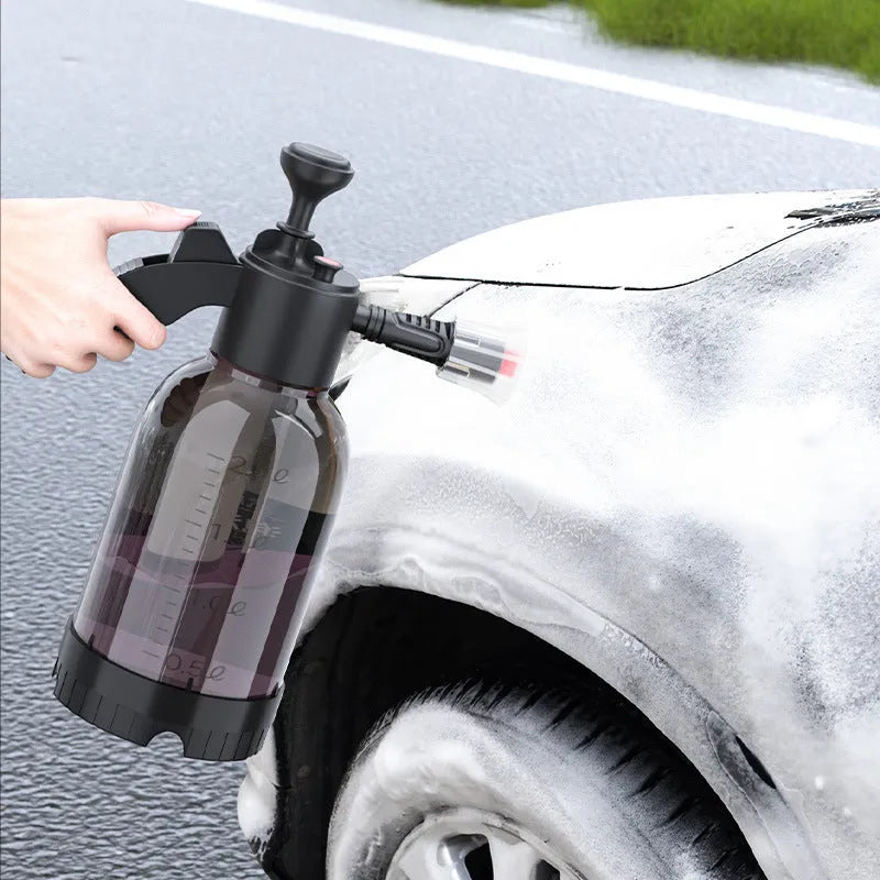 Black 2L foam watering can spray bottle with ergonomic handle and switch lock for car and household use.