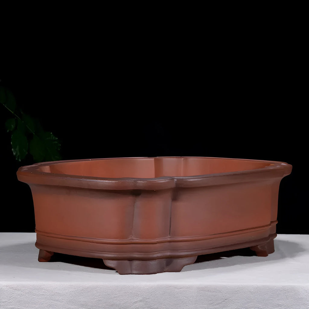 Large antique-finished Chinese purple clay flowerpot measuring 71cm long