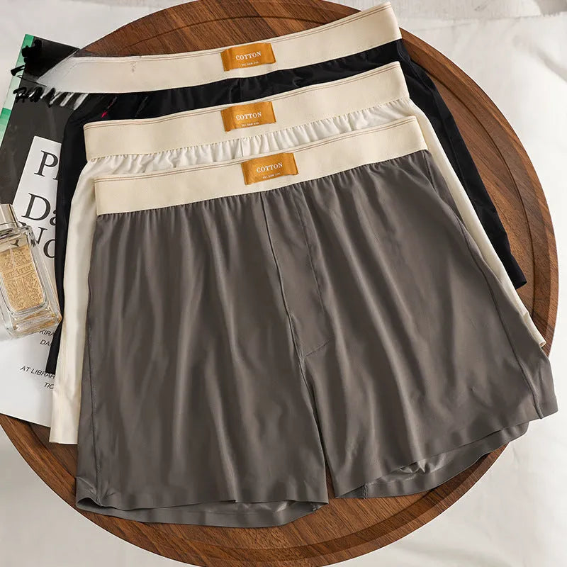 Men's solid colour loose ice silk underwear in a multi-pack.