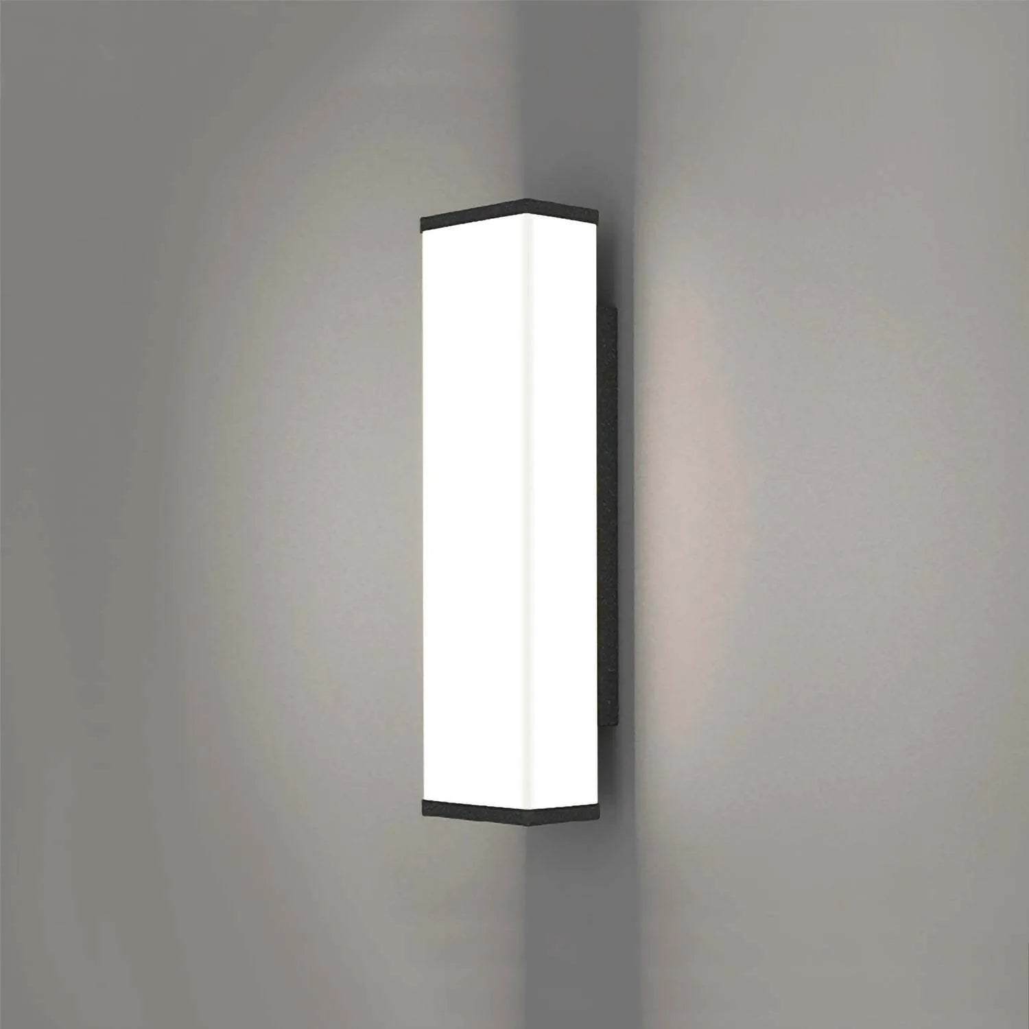 Stainless steel long strip outdoor wall light mounted on a wall, 60cm tall.