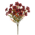 Artificial silk flower bouquet in autumn colours of red, yellow, and orange for wedding and home decoration