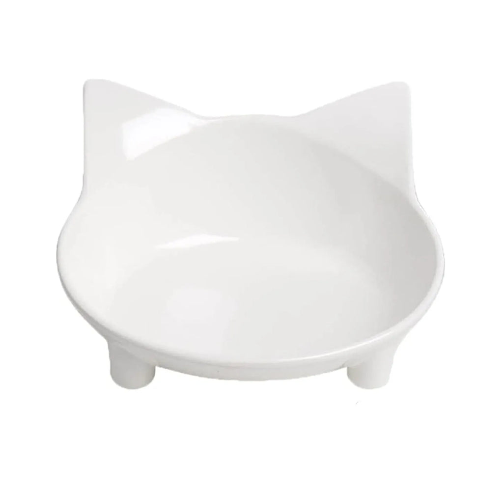 Shallow black or white melamine cat bowl with a non-slip rubber base on a table.