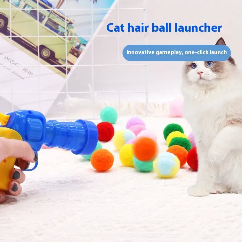 Pet toy gun launcher with colourful plush balls for dogs and cats interactive play