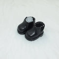 A pair of small black boots for a 17cm fashion doll, an example from the 18-style replacement shoe collection.