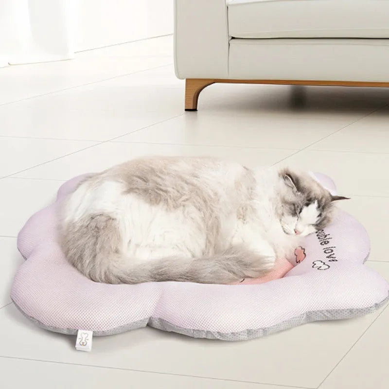 Ice silk pet cooling mat in green or pink colours showing four size options for dogs and cats