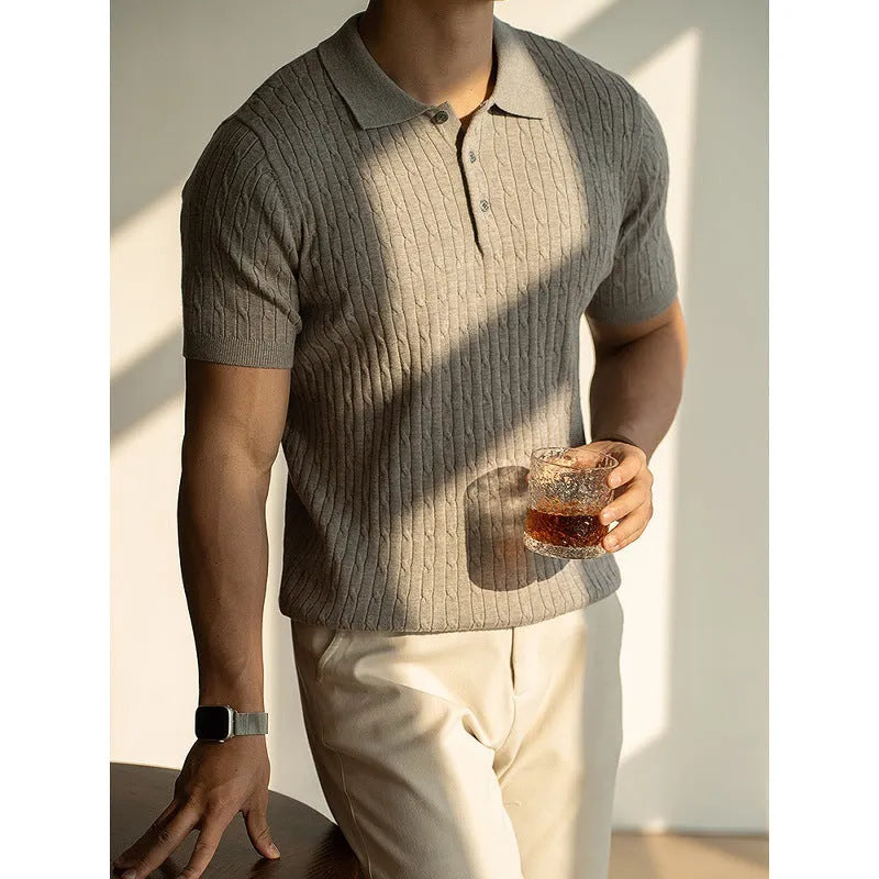 Men's khaki short-sleeve business top on a hanger, showing front design.