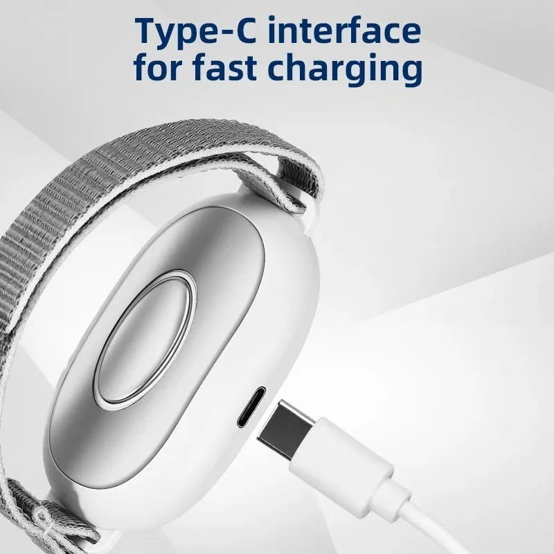 White sleep aid bracelet device with remote control and 20 intensity gears on a USB charging cable