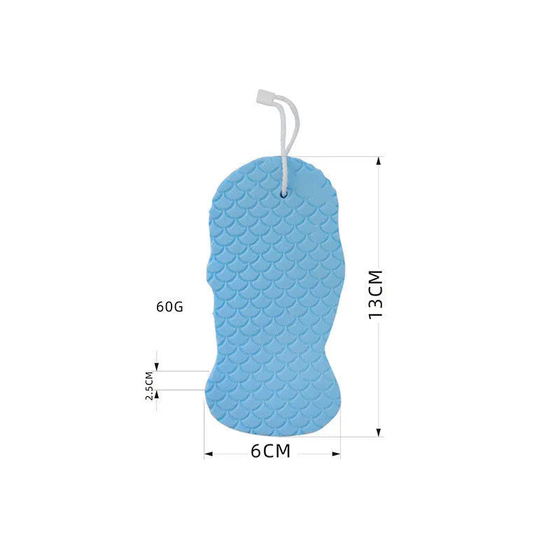 3D white bath sponge with fish scale pattern for gentle body exfoliation.