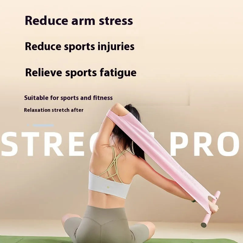 Grey or pink yoga stretching tool for shoulder and hip flexibility exercises