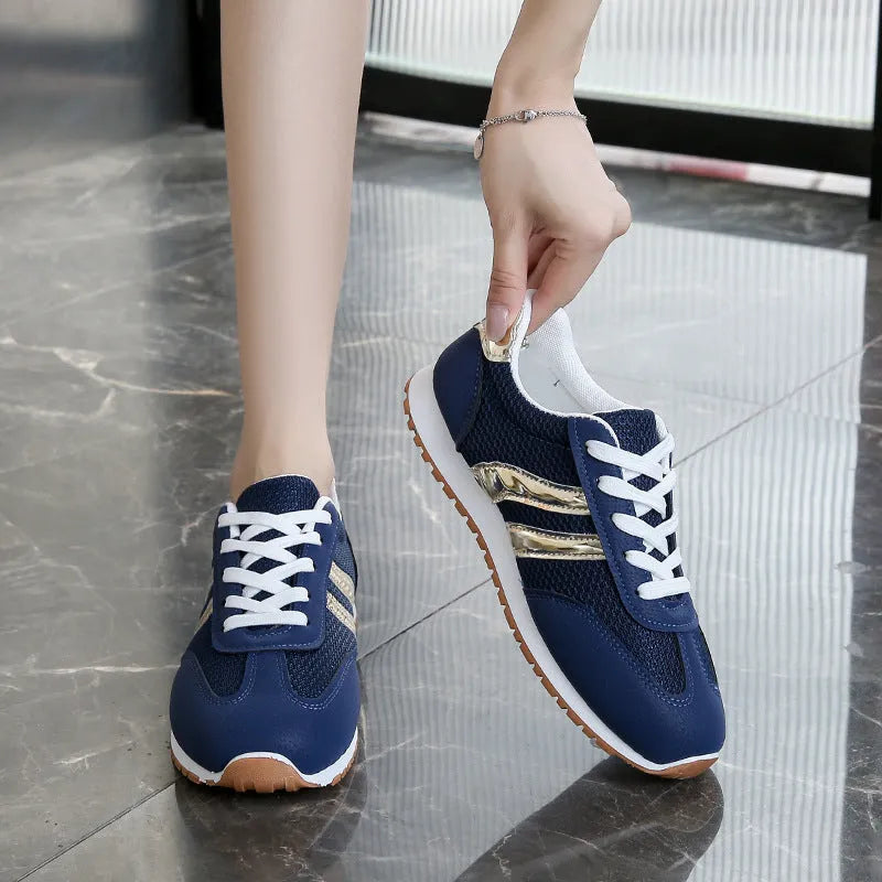 Blue women's artificial leather sports shoes with cross straps and non-slip rubber sole